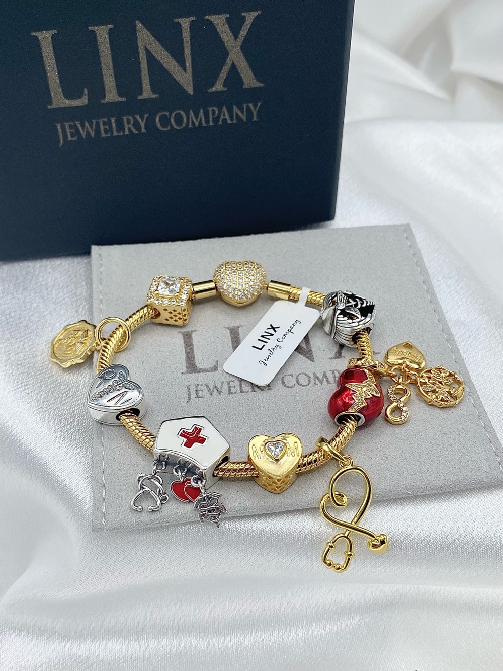 Linx Gold Snake Chain Charm Bracelet with Registered Nurse, Mom & Family Charms
